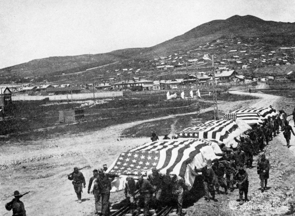 American interventionists are carrying platforms with the dead during the fighting in the Far East for further transportation to the USA. 1920